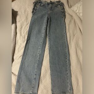 Jeans with chain up the side